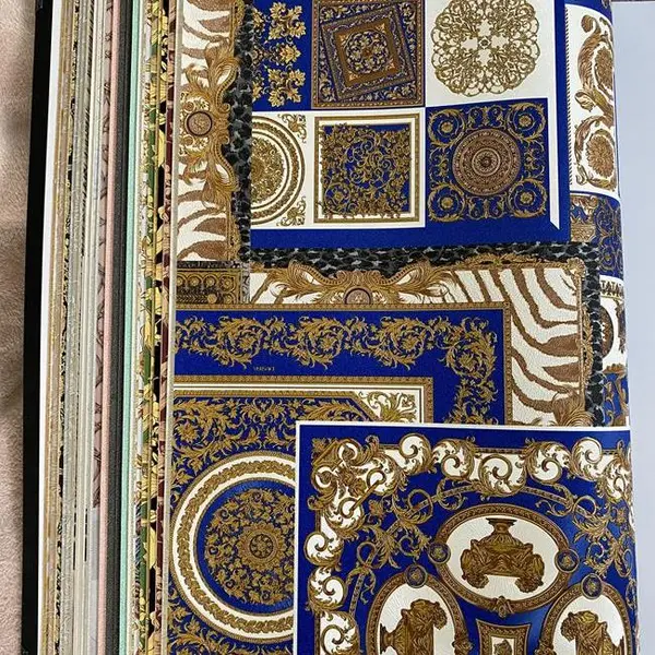 Luxurious Versace Découpage wallpaper with blue and gold squares