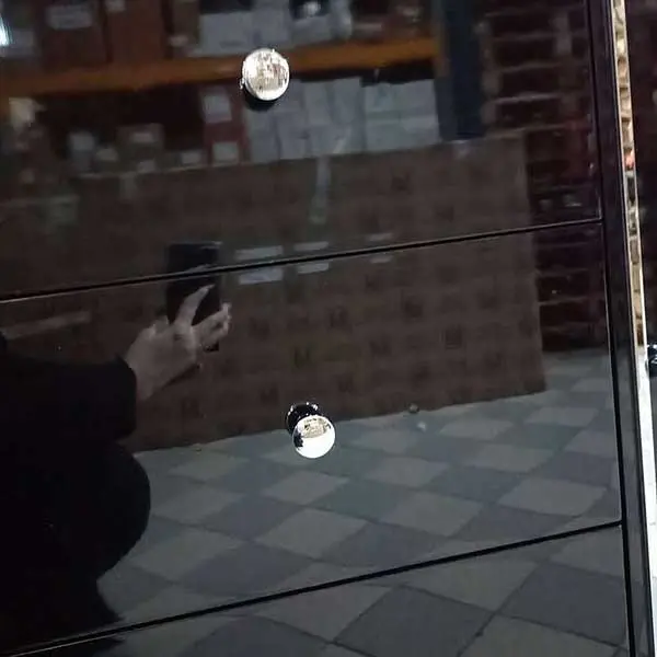 A glamor lacquered wooden chest of drawers with steel legs, black modern Lorenzo L Silver OUTLET