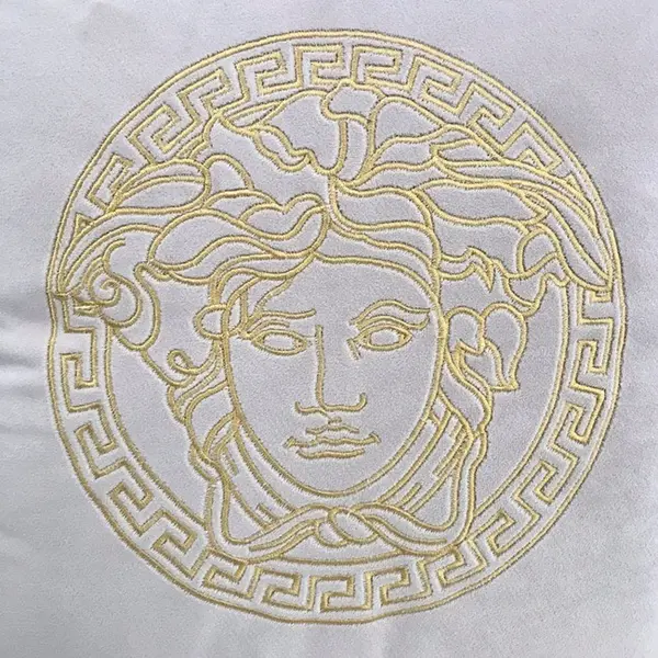 Decorative velvet pillow beige with gold logo Medusa