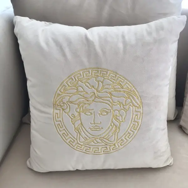 Decorative velvet pillow beige with gold logo Medusa