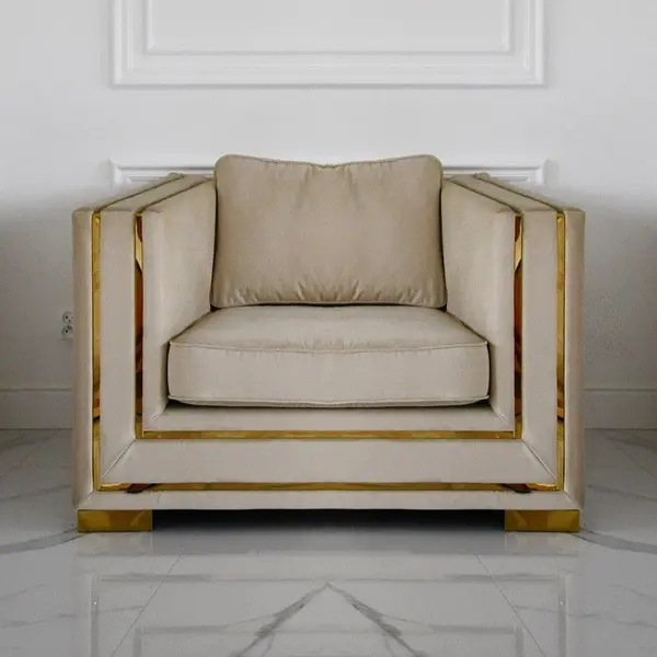Modern upholstered glamor armchair with gold and silver MONACO slats