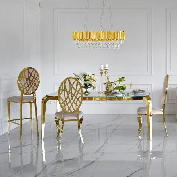 Designer dining table, glamor, with a glass top, steel, gold ELITE OUTLET