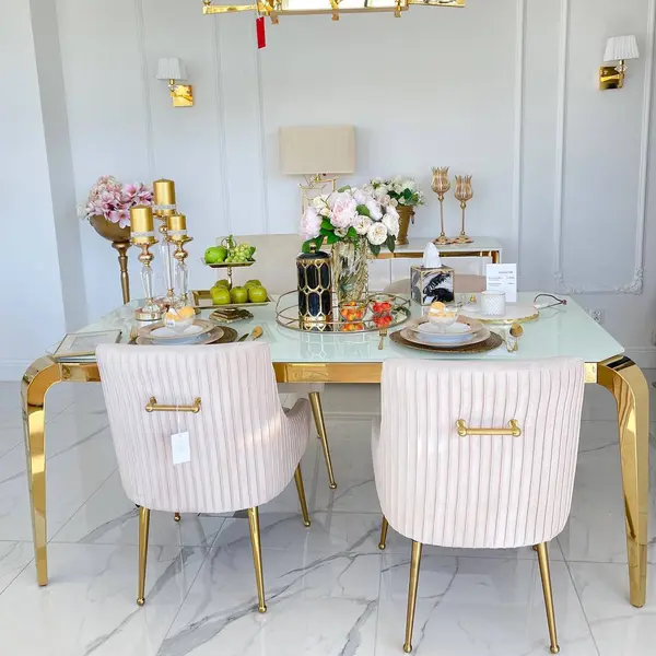 Designer dining table, glamor, with a glass top, steel, gold ELITE OUTLET