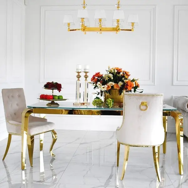 Designer dining table, glamor, with a glass top, steel, gold ELITE OUTLET