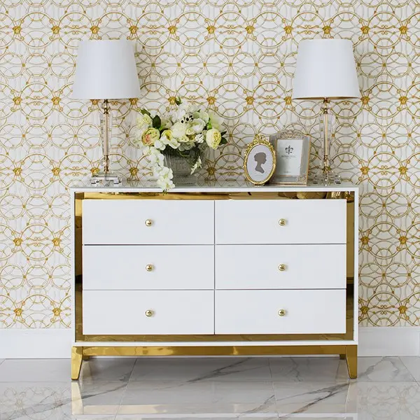 Lorenzo M Gold Glamour wooden lacquered chest of drawers with steel legs