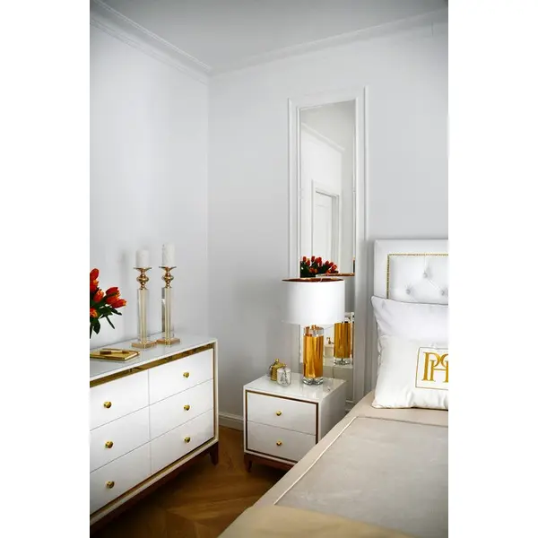 Lorenzo M Gold Glamour wooden lacquered chest of drawers with steel legs