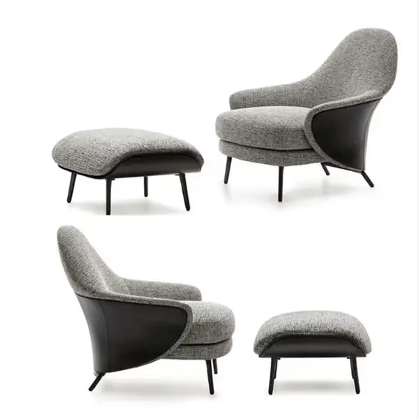 Modern, upholstered designer armchair on black legs with a LINEA footstool
