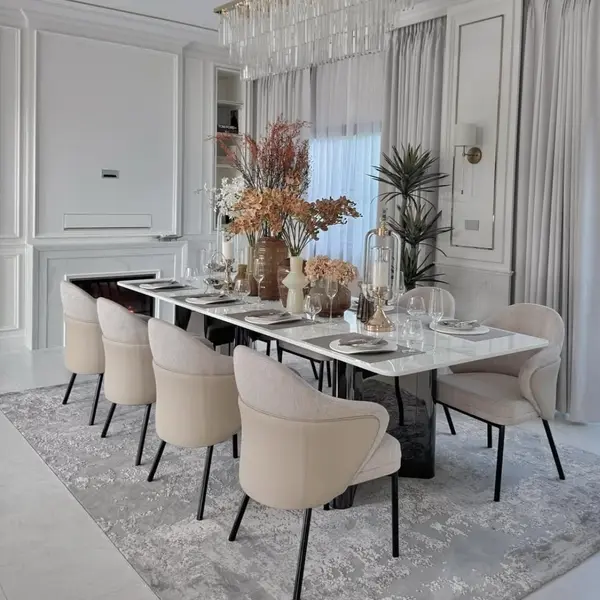 Modern, luxurious dining chair with black metal legs from LINEA