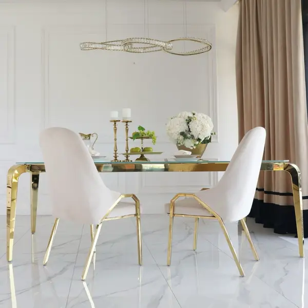 Designer dining table, glamor, with a glass top, steel, gold ELITE