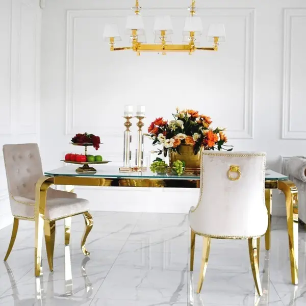 Designer dining table, glamor, with a glass top, steel, gold ELITE