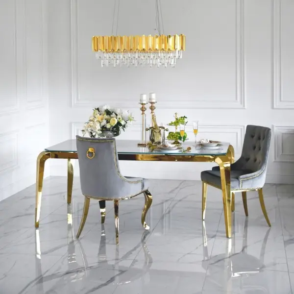 Designer dining table, glamor, with a glass top, steel, gold ELITE