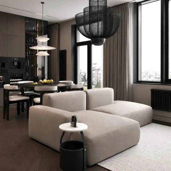 Aranżacja okrągłego stolika kawowego Tavolino w nowoczesnym salonie. Projekt od Primavera Home.