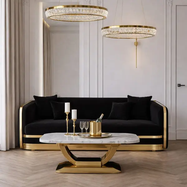 złota sofa czarna tapicerowana