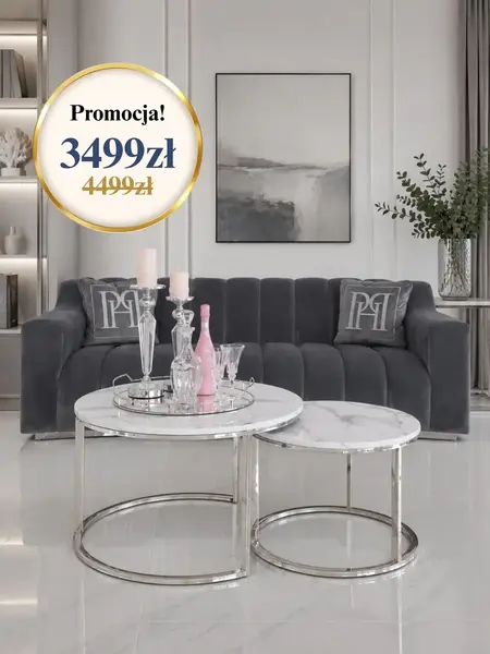 Perspektywa na okrągły stolik kawowy srebrny z marmurowym blatem 2w1, ukazująca jego nowoczesny design. Aranżacja nowoczesnego wnętrza od Primavera Home.