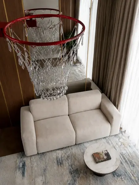 Luksusowa nowoczesna sofa rozkładana do salonu MODERNO z góry, pokazująca układ poduszek. Aranżacja nowoczesnego wnętrza od Primavera Home.