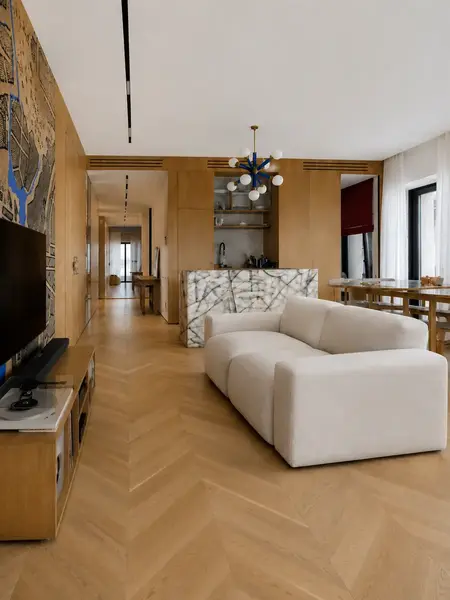 Luksusowa nowoczesna sofa rozkładana do salonu MODERNO w zbliżeniu, eksponująca miękkość materiału. Meble na zamówienie od Primavera Home.