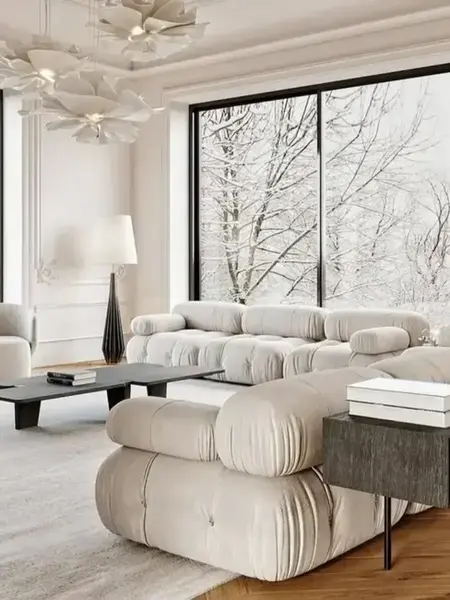 Detal poduszek designerskiego narożnika modułowego boucle NICEA w aranżacji nowoczesnego wnętrza. Primavera Home.