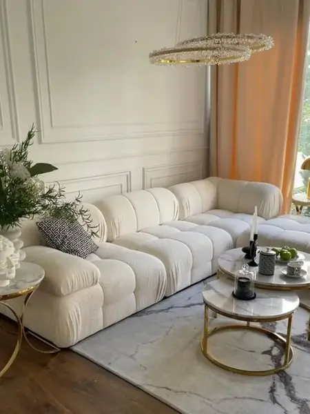 Widok z kategorialny na designerski narożnik modułowy boucle NICEA w nowoczesnym stylu. Meble na zamówienie w Primavera Home.