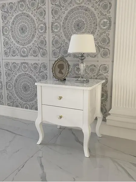 Biała szafka nocna glamour na giętych nogach