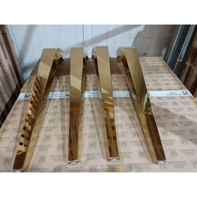 Designer dining table, glamor, with a glass top, steel, gold ELITE OUTLET 