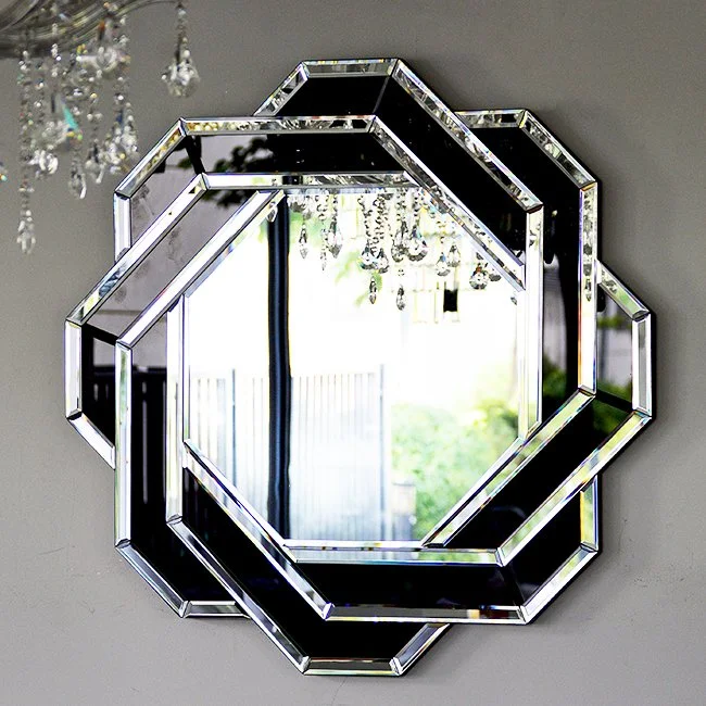 A wall mirror in a round gold and white geometric frame will beautifully highlight your corridor, hall or bathroom