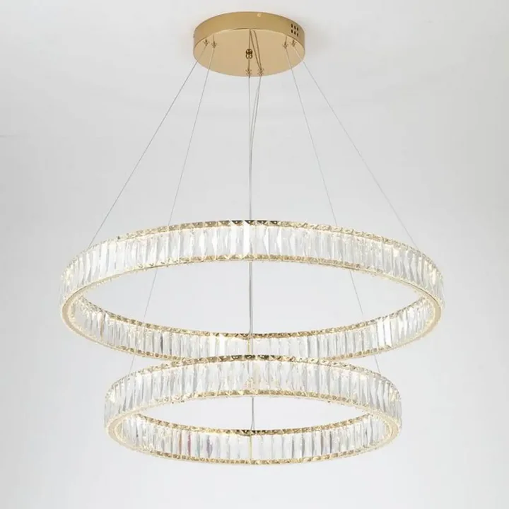 Żyrandol Kryształowy CRYSTAL L oświetlający jadalnię od Primavera Home.