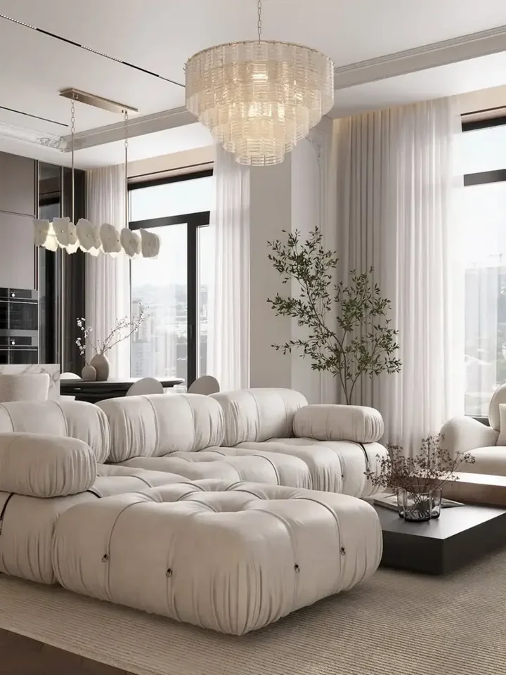 Ekspozycja pełna designerskiego narożnika modułowego boucle NICEA w nowoczesnym wnętrzu. Meble na zamówienie od Primavera Home.