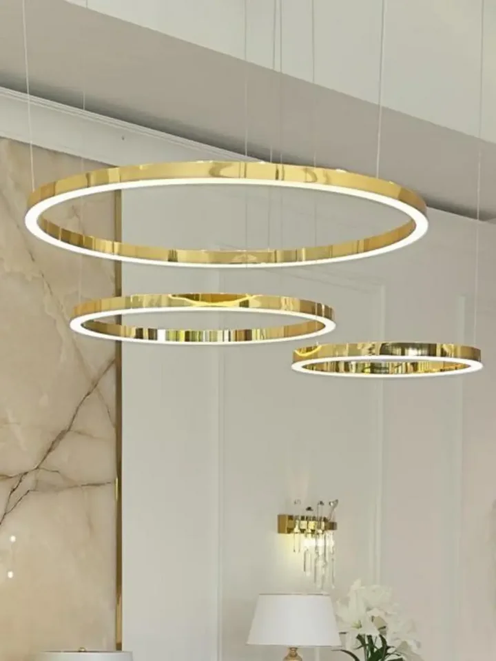 Lampa glamour led GALASSIA okrągła z połyskiem ringi, regulowana, nowoczesna, loft do salonu złota OUTLET w ujęciu z przodu. Oświetlenie na zamówienie od Primavera Home.