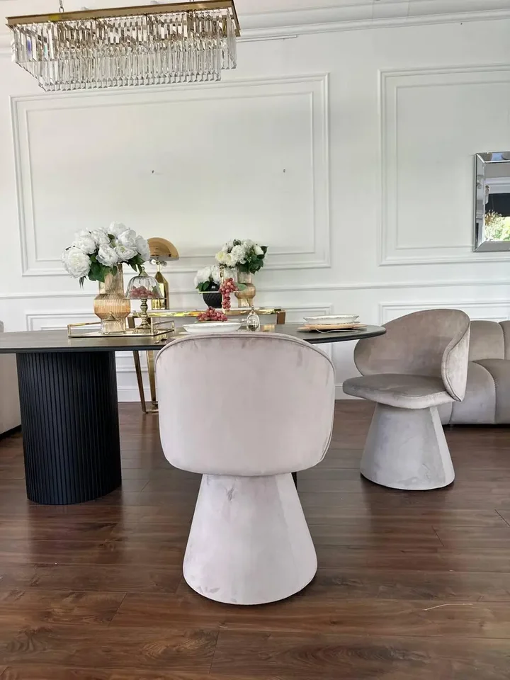 Nowoczesne Krzesło Obrotowe Dolce – Tapicerowane i Designerskie eksponowane w showroomie. Detal wykończenia od Primavera Home.