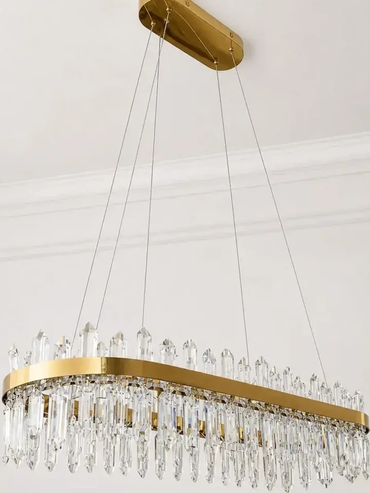 Zmiana barwy światła w Żyrandolu BULGARI L 100cm Złoty, dostosowanego do nastroju. Ekspozycja w salonie od Primavera Home.