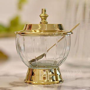 Round glass, glamorous sugar bowl with a lid, with a spoon, a gold sugar bowl