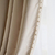 Exclusive curtain richly decorated with haberdashery 