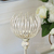 A metal glass candlestick with a VILLA S lampshade 28cm