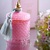 Dekoratyvinė kvapni žvakė stikliniame krištoliniame inde, rožinis auksas 