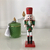 Nutcracker with Christmas tree M red