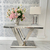 Modern, glamorous silver console, white marble top, for the LV COLLECTION hall