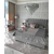 A glamor upholstered quilted bed modern New York style gray SPECTRE