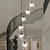 Żyrandol kryształowy STARS XL, wiszący, złoty, designerski, ekskluzywny w stylu nowoczesnym, ze szklanymi kloszami, lampa wisząca nad schody, hol 