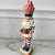 Striped nutcracker with a cupcake on the head, 31 cm 