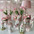 Pink ceramic flower pot with white stripes, decoration 