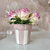 Pink ceramic flower pot with white stripes, decoration 
