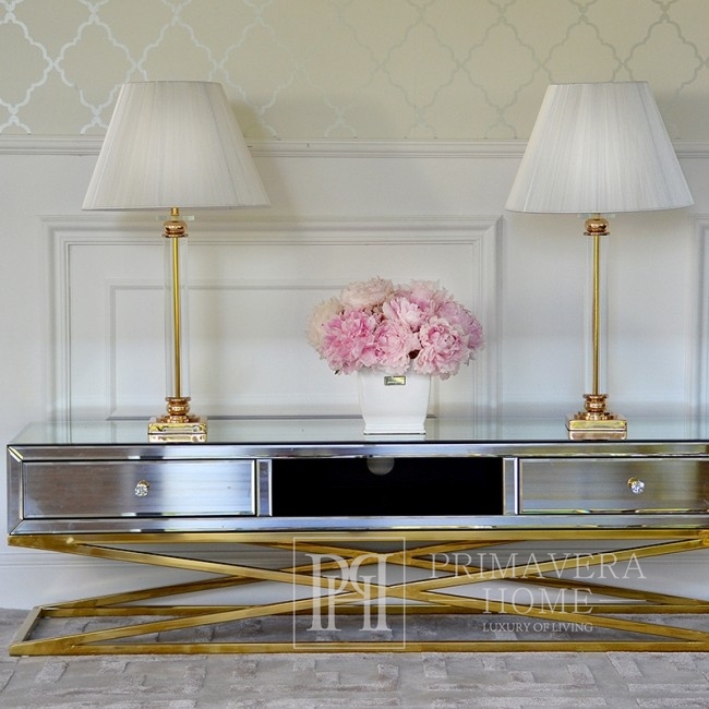 Der glanzvolle Glamour-Schrank CHICAGO RTV ist ein schönes und praktisches Möbelstück in Weiß und Gold, passend zum Wohnzimmer