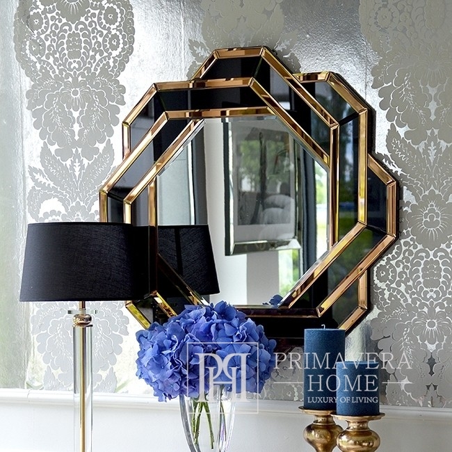 Ein Wandspiegel in einem runden gold-schwarzen geometrischen Rahmen wird Ihren Flur, Ihre Diele oder Ihr Badezimmer wunderschön zur Geltung bringen.
