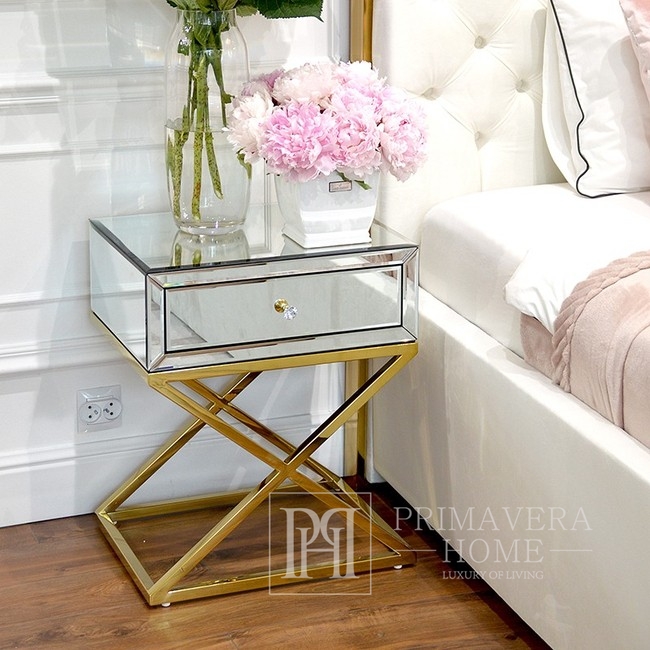 Extremely stylish glamor Chicago Gold nightstand has small utility drawers that will accommodate all the necessary trinkets.