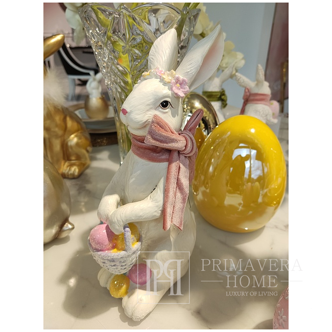 White Easter rabbit, with a pink bow, with a basket of Easter eggs, glamor