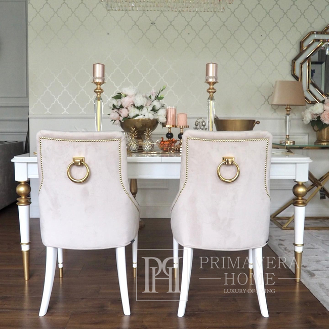 Modern, golden PRINCE glamor chair with a knocker for the dining room
