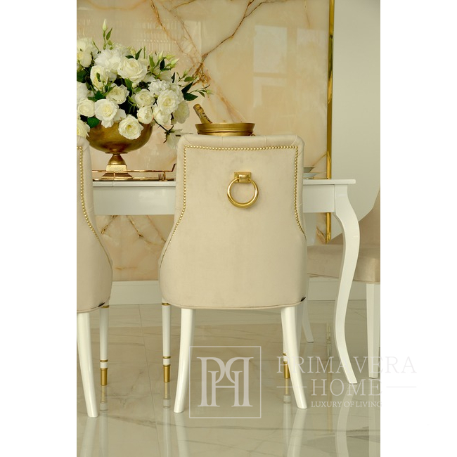 Modern, golden PRINCE glamor chair with a knocker for the dining room