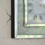 Diamant-Wanduhr PAOLA SILVER mit klarem Spiegel verziert mit quadratischem Silber 50x50 