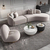 Dizainerinė kampinė sofa, pusapvalė, moderni, smėlio spalvos, auksinė kampinė sofa 280cm MIAMI 
