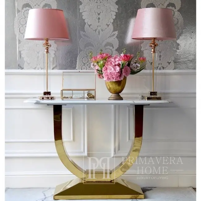 A console in a modern glamor style with a white marble top, ART DECO gold
